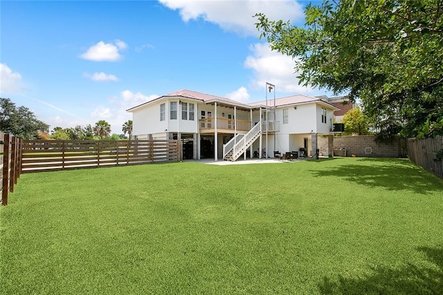 4320 Alba Rd, New Orleans, LA 70129 - rear view of house with stairway, a fenced backyard, and a patio
