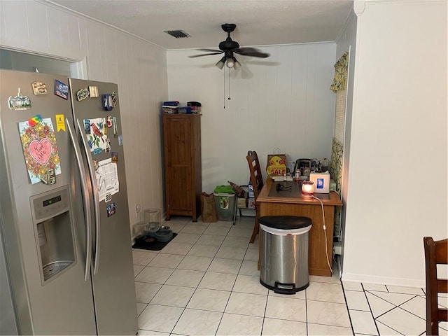 2305 26th St, Kenner, LA 70062 - dining area with a ceiling fan, ornamental molding, light tile patterned flooring, and wooden walls
