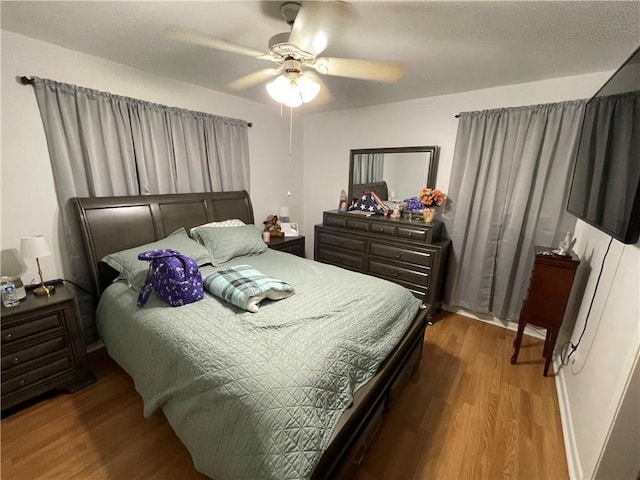 2305 26th St, Kenner, LA 70062 - bedroom featuring wood finished floors and a ceiling fan