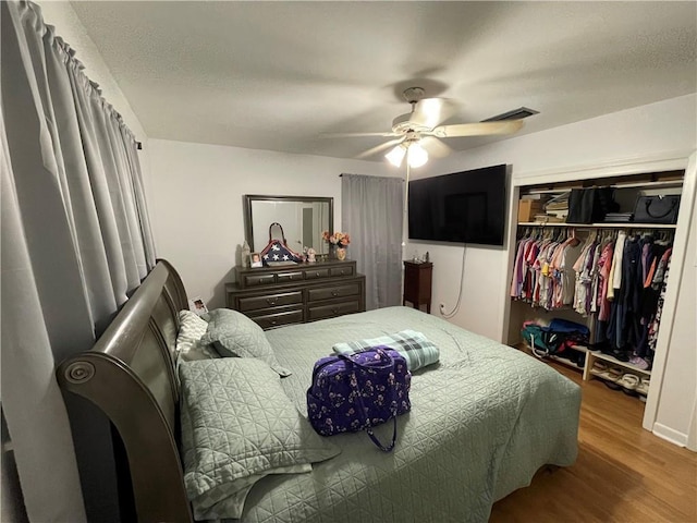 2305 26th St, Kenner, LA 70062 - bedroom with a closet, wood finished floors, and a ceiling fan