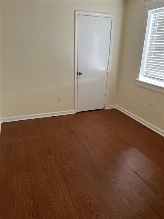 1615 Pratt St, Gretna, LA 70053 - unfurnished room with baseboards and dark wood finished floors