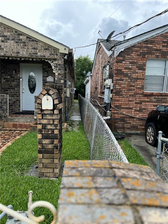 1615 Pratt St, Gretna, LA 70053 - view of property exterior with brick siding