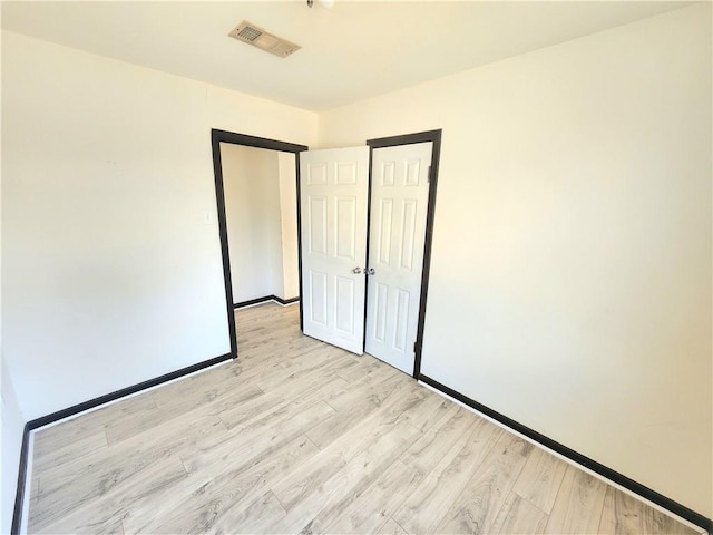 106 Treuil Ln, Belle Chasse, LA 70037 - unfurnished room with light wood finished floors and baseboards