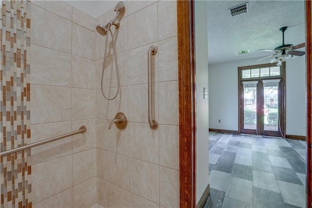 119 Gondrella Dr, Belle Chasse, LA 70037 - bathroom with tiled shower and a ceiling fan