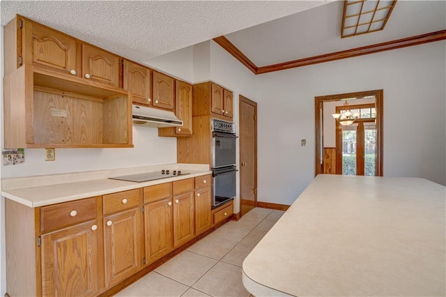 119 Gondrella Dr, Belle Chasse, LA 70037 - kitchen with black appliances, under cabinet range hood, ornamental molding, light tile patterned flooring, and light countertops