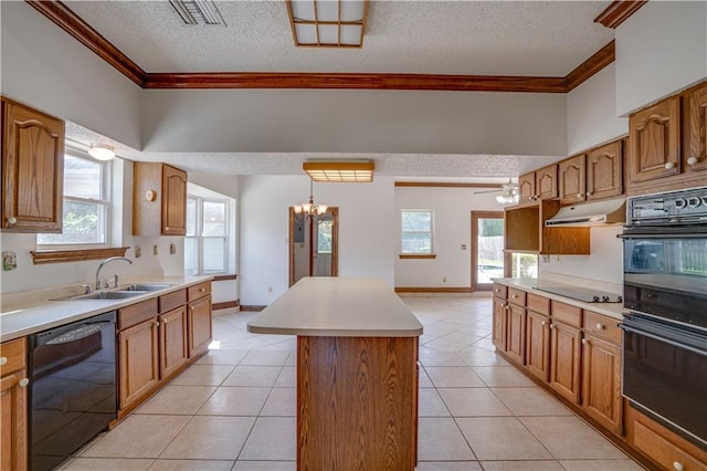119 Gondrella Dr, Belle Chasse, LA 70037 - kitchen with black appliances, a kitchen island, ornamental molding, a textured ceiling, and under cabinet range hood