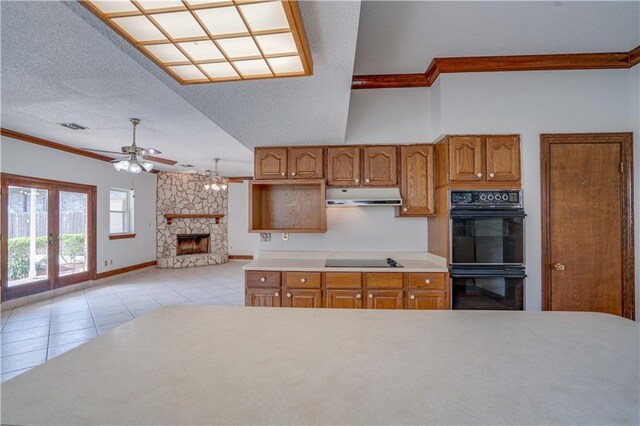 119 Gondrella Dr, Belle Chasse, LA 70037 - kitchen featuring black appliances, under cabinet range hood, crown molding, a ceiling fan, and brown cabinetry