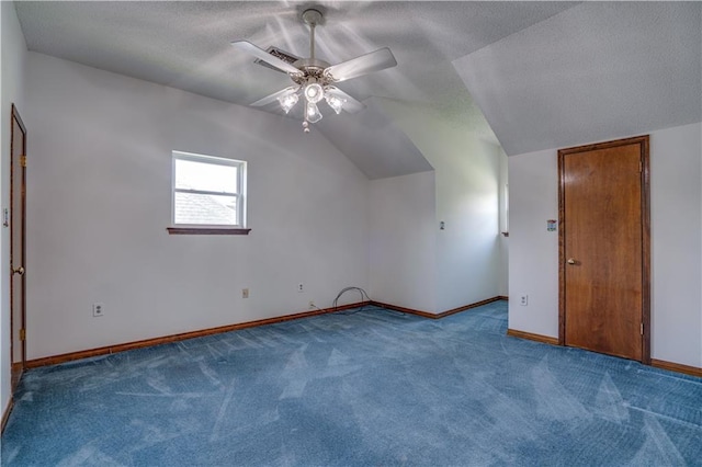 119 Gondrella Dr, Belle Chasse, LA 70037 - bonus room featuring carpet, a ceiling fan, vaulted ceiling, and a textured ceiling