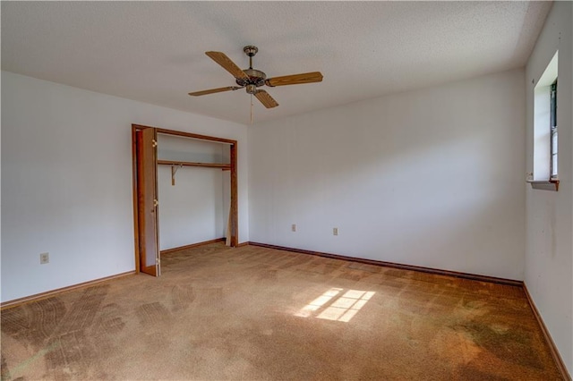 119 Gondrella Dr, Belle Chasse, LA 70037 - unfurnished bedroom with carpet, a ceiling fan, a closet, and a textured ceiling