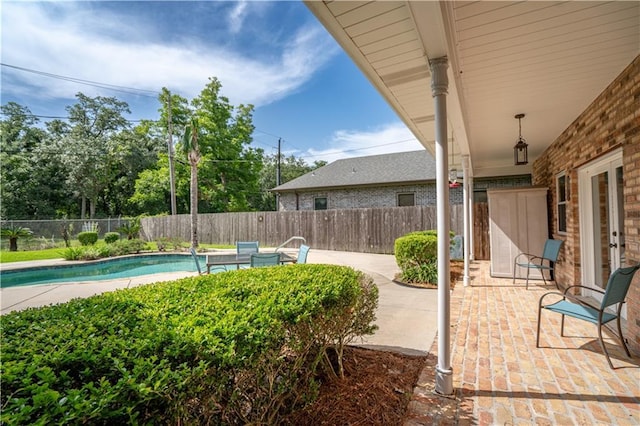 119 Gondrella Dr, Belle Chasse, LA 70037 - fenced backyard with french doors and a patio