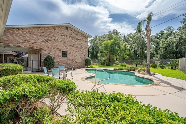 119 Gondrella Dr, Belle Chasse, LA 70037 - view of pool with a patio and a fenced backyard