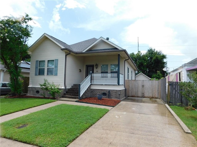 22 Davis Blvd, Jefferson, LA 70121 - view of front facade with a porch and concrete driveway