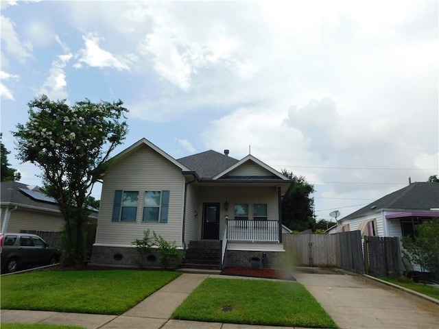 22 Davis Blvd, Jefferson, LA 70121 - view of front facade with concrete driveway and a porch