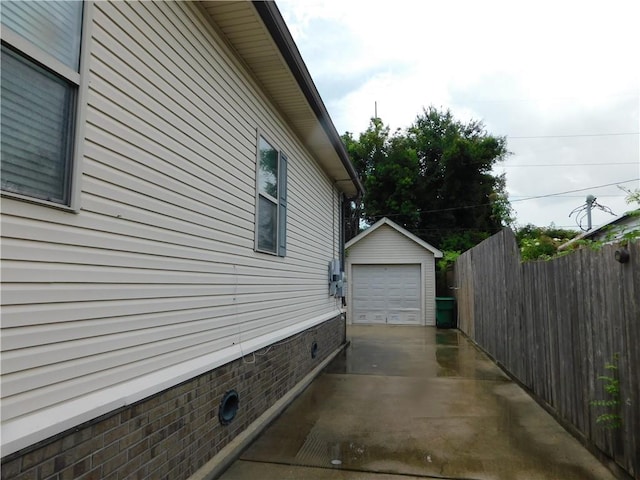 22 Davis Blvd, Jefferson, LA 70121 - view of side of home featuring an outdoor structure, a garage, driveway, and crawl space