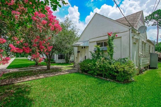 157 Gruner Rd, Metairie, LA 70001 - view of front of house featuring a front yard and stucco siding