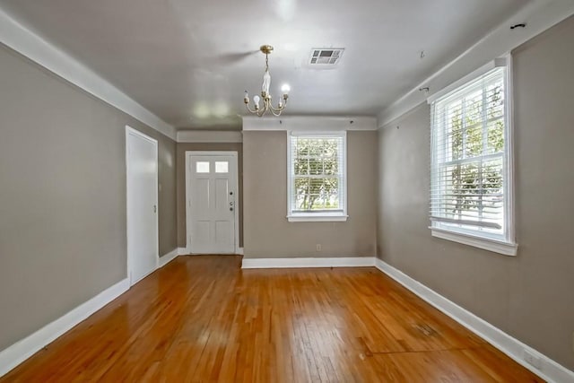 157 Gruner Rd, Metairie, LA 70001 - entrance foyer featuring a chandelier and hardwood / wood-style flooring