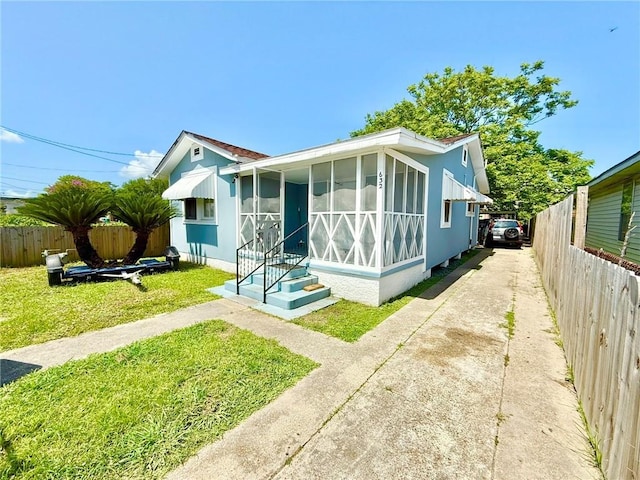 632 Eiseman St, Marrero, LA 70072 - view of front of property featuring concrete driveway, entry steps, and a sunroom