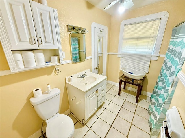 632 Eiseman St, Marrero, LA 70072 - bathroom with ceiling fan, vanity, and tile patterned floors