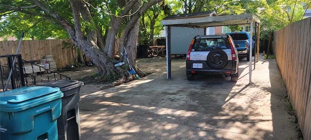 632 Eiseman St, Marrero, LA 70072 - view of parking / parking lot with a detached carport and driveway