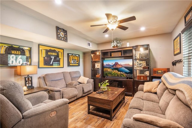 1500 Madewood Rd, La Place, LA 70068 - living room with wood finished floors, ceiling fan, and recessed lighting