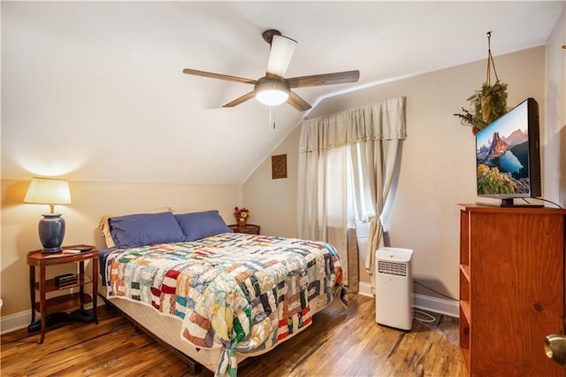 1500 Madewood Rd, La Place, LA 70068 - bedroom featuring wood finished floors, vaulted ceiling, and ceiling fan