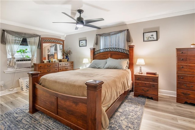 1500 Madewood Rd, La Place, LA 70068 - bedroom with crown molding, wood finished floors, ceiling fan, and cooling unit