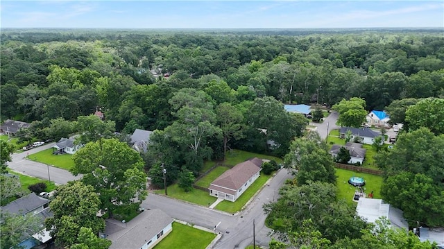200 N Steele Ave, Picayune, MS 39466 - aerial view of property and surrounding area with a heavily wooded area