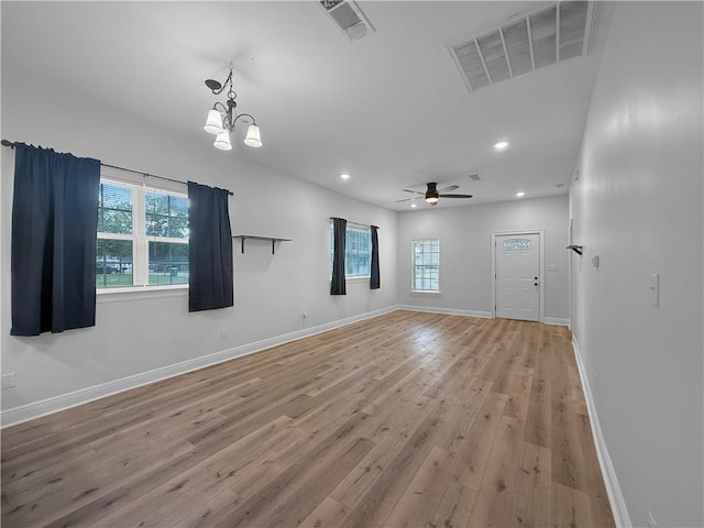 200 N Steele Ave, Picayune, MS 39466 - unfurnished room featuring light wood-style floors, healthy amount of natural light, recessed lighting, a ceiling fan, and a chandelier