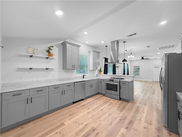 200 N Steele Ave, Picayune, MS 39466 - kitchen with appliances with stainless steel finishes, gray cabinets, a peninsula, a ceiling fan, and recessed lighting