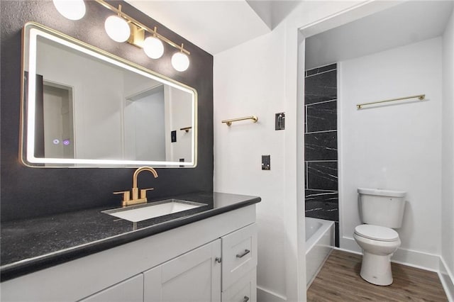 57 Driftwood Blvd, Kenner, LA 70065 - bathroom with vanity, wood finished floors, and shower / bathtub combination