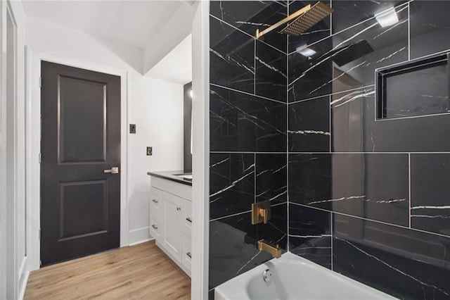 57 Driftwood Blvd, Kenner, LA 70065 - bathroom with vanity, shower / bath combination, and wood finished floors
