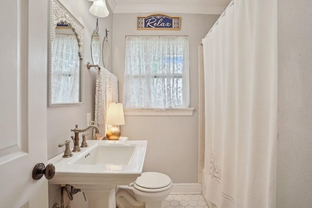 4320 Academy Dr, Metairie, LA 70003 - full bath featuring toilet and tile patterned flooring