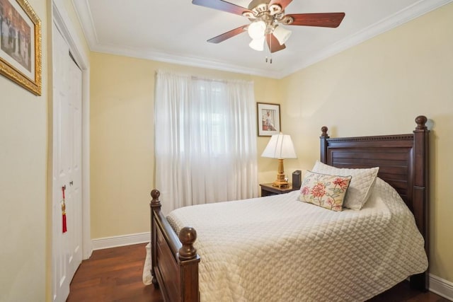 4320 Academy Dr, Metairie, LA 70003 - bedroom featuring wood finished floors, a closet, crown molding, and ceiling fan