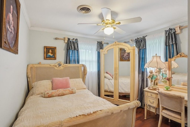 4320 Academy Dr, Metairie, LA 70003 - bedroom featuring crown molding, dark wood-style floors, and ceiling fan