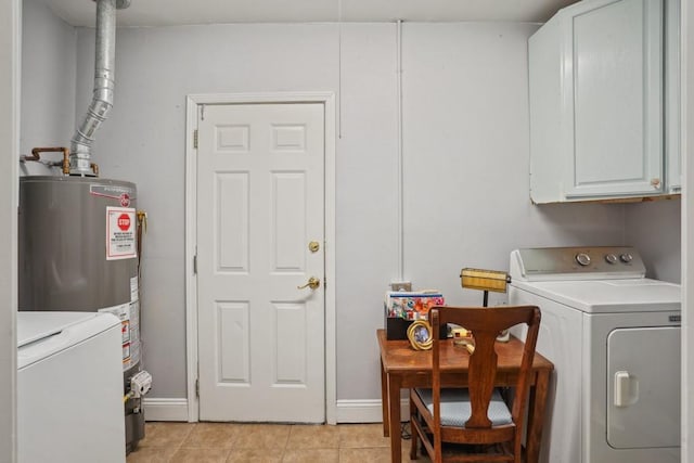 4320 Academy Dr, Metairie, LA 70003 - laundry area featuring cabinet space, gas water heater, washer and clothes dryer, and light tile patterned flooring