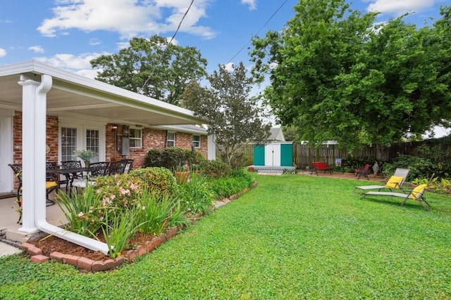 4320 Academy Dr, Metairie, LA 70003 - view of yard featuring a shed and a patio area