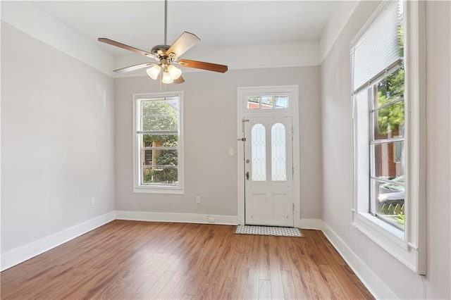 81214 Eliza St, New Orleans, LA 70114 - foyer entrance featuring light wood-type flooring and ceiling fan