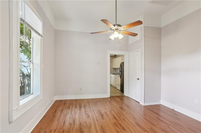 81214 Eliza St, New Orleans, LA 70114 - spare room featuring light wood-type flooring and a ceiling fan