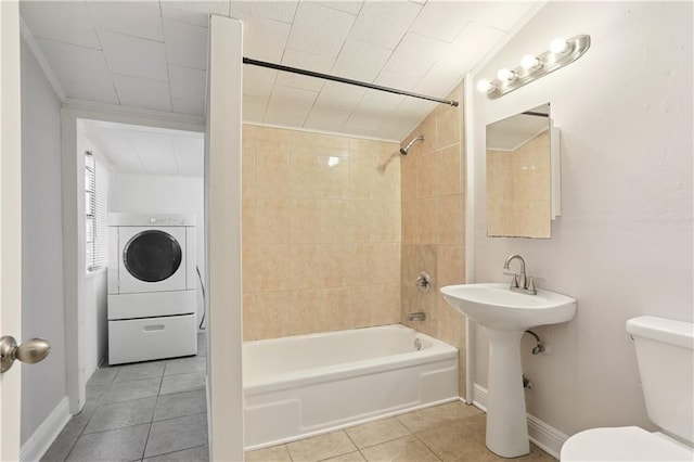 81214 Eliza St, New Orleans, LA 70114 - bathroom with tile patterned floors, shower / washtub combination, and washer / clothes dryer