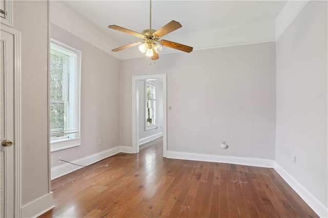 81214 Eliza St, New Orleans, LA 70114 - spare room with healthy amount of natural light, wood-type flooring, and a ceiling fan