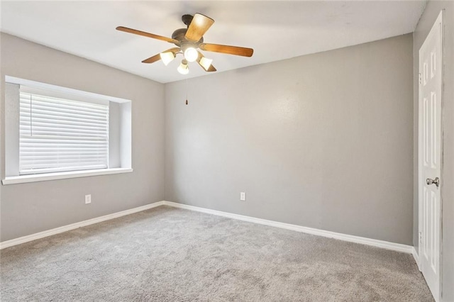128 Hollow Rock Ct, Slidell, LA 70461 - spare room featuring carpet and a ceiling fan