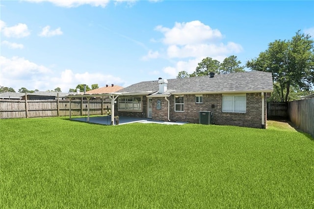128 Hollow Rock Ct, Slidell, LA 70461 - back of house with a patio, a fenced backyard, and brick siding