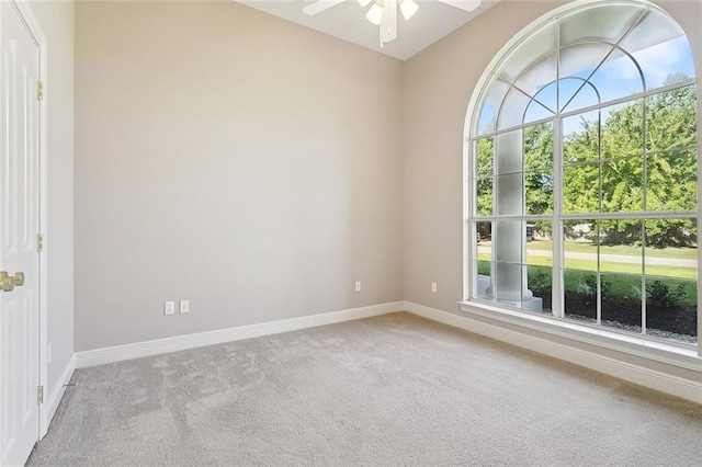 319 Red Maple Dr, Mandeville, LA 70448 - carpeted empty room featuring plenty of natural light and a ceiling fan