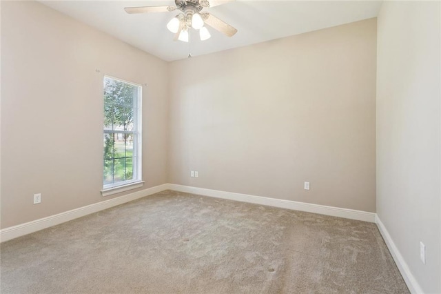 319 Red Maple Dr, Mandeville, LA 70448 - carpeted spare room with a ceiling fan and baseboards