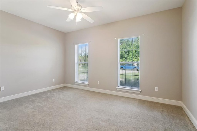 319 Red Maple Dr, Mandeville, LA 70448 - empty room with light colored carpet and ceiling fan