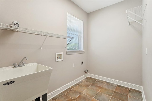 319 Red Maple Dr, Mandeville, LA 70448 - laundry room with washer hookup, hookup for an electric dryer, and tile patterned flooring