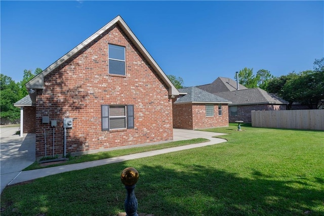 319 Red Maple Dr, Mandeville, LA 70448 - view of side of property with brick siding