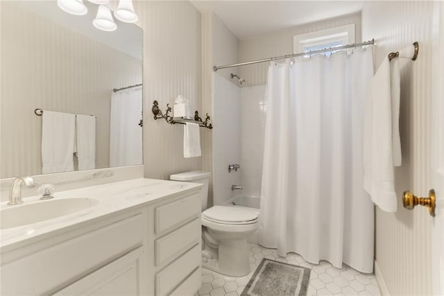 5421 St Charles Ave Unit 2D, New Orleans, LA 70115 - bathroom featuring vanity, shower / tub combo with curtain, and tile patterned floors