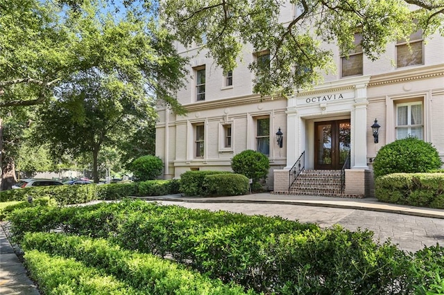 5421 St Charles Ave Unit 2D, New Orleans, LA 70115 - view of front of property featuring french doors and brick siding