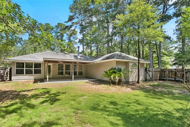 3 Trace Loop, Mandeville, LA 70448 - back of property with a patio and a fenced backyard